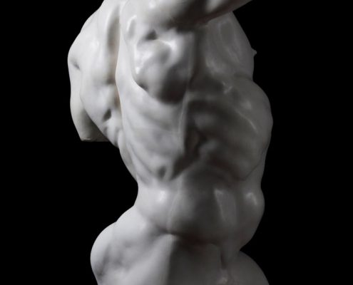 A statue of a man with no shirt on.