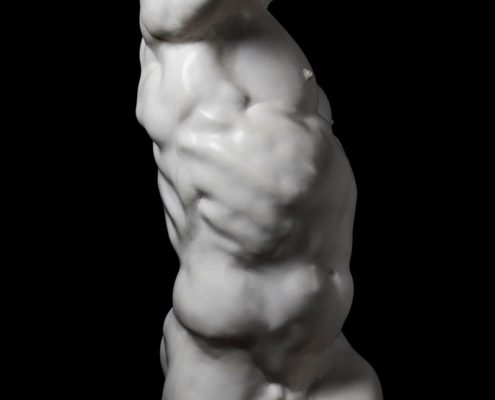 A statue of a man with no shirt on.