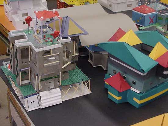 A model of a city with buildings and cars.