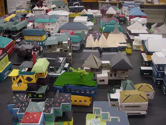 A bunch of toy buildings are all in the same color