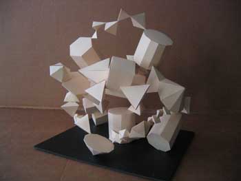 A sculpture of white shapes on top of black base.