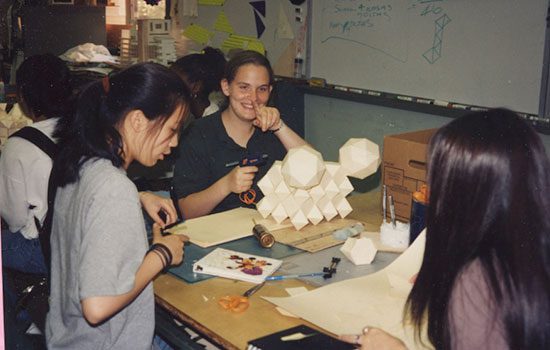 A group of people sitting around a table.