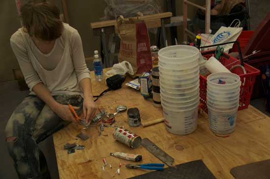 A man working on some parts of a toy