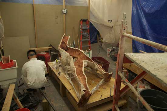 A man working on a piece of wood.