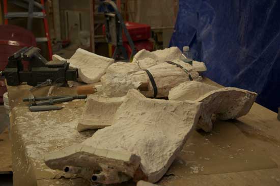 A pile of concrete sitting on top of the floor.