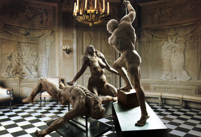 A group of statues that are sitting in the middle of a room.